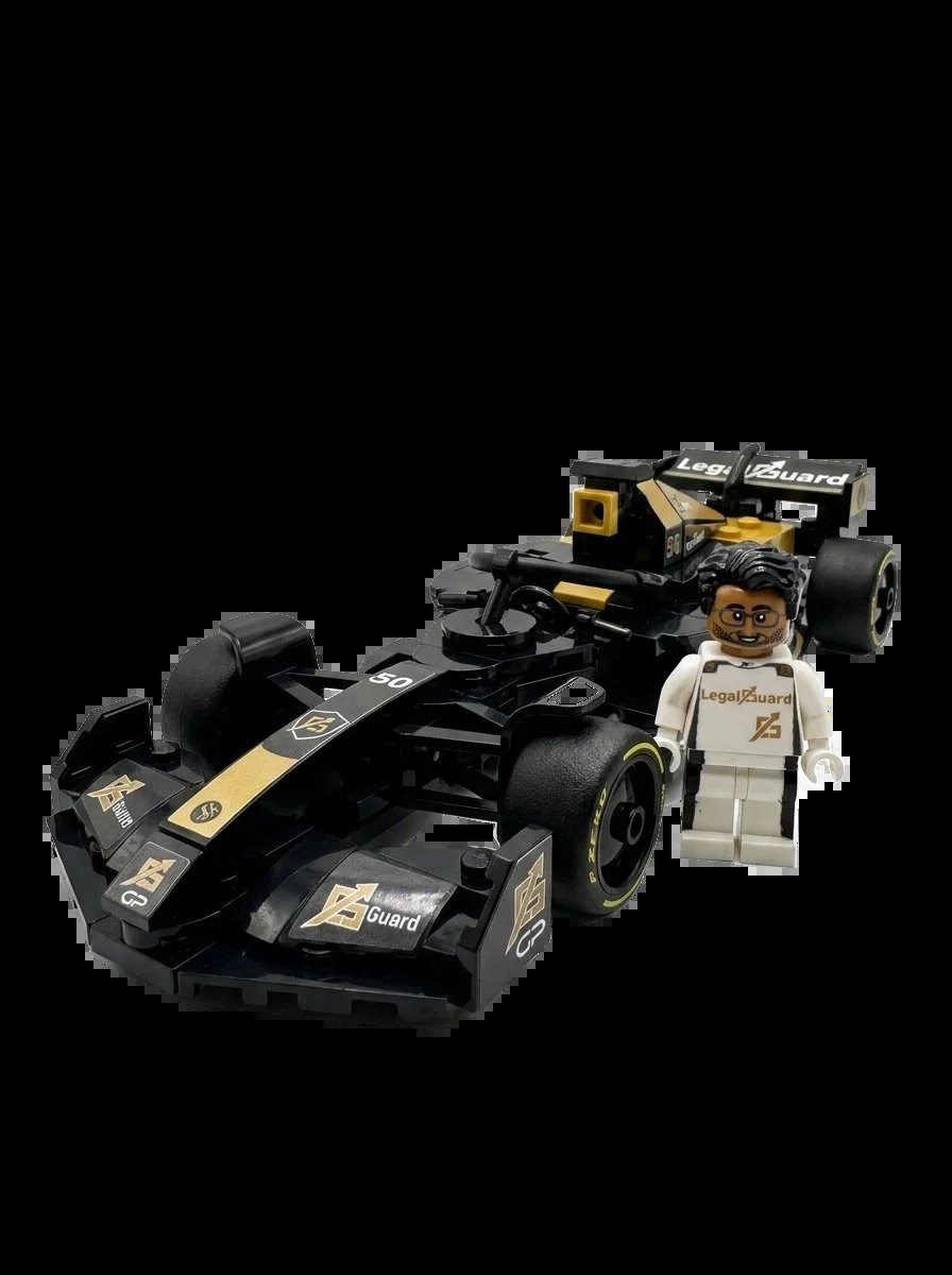 LEGO black and gold race cars with minifigure driver in white racing suit
